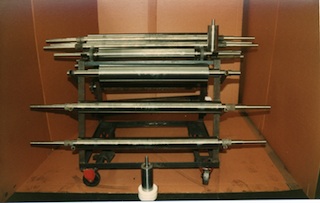 Flexoplate rollers on support stand after grinding